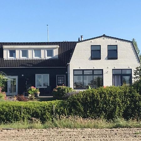 T Huuske Tuinappartement Met Fantastisch Uitzicht, Nabij Zee Zonnemaire エクステリア 写真