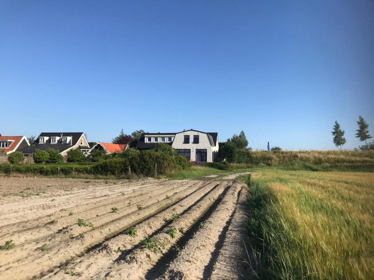 T Huuske Tuinappartement Met Fantastisch Uitzicht, Nabij Zee Zonnemaire エクステリア 写真